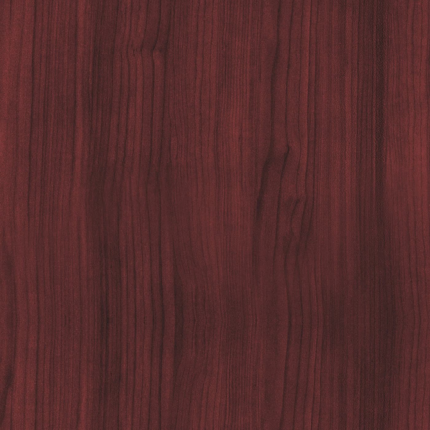 Close-up of rich, polished dark mahogany wood grain